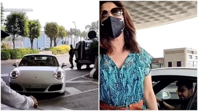 Madhuri Dixit’s husband Dr Shriram Nene dropped her at Mumbai airport in his new car Porsche. Madhuri Dixit’s husband Dr Shriram Nene dropped her at Mumbai airport in his new car Porsche.