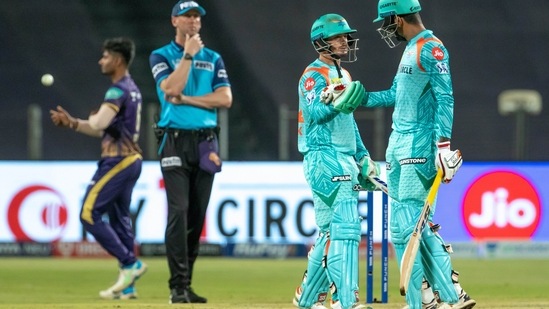 Deepak Hooda of Lucknow Super Giants congratulates his teammate, Quinton De Kock for scoring a half-century(PTI)