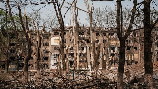 Trees and apartments are damaged by the impact of a missile explosion in Kramatorsk, eastern Ukraine.