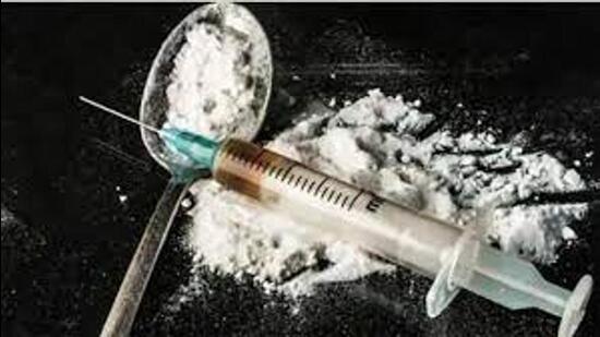 The parolee was to return to jail later this month. Around 60g heroin was recovered from his wife who was arrested. (HT PHOTO )