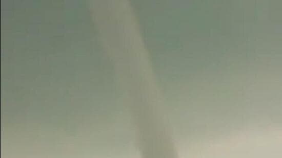 In a rare occurrence, a tornado was seen in Barpeta district of Assam on Saturday morning. No deaths or injuries were reported, officials said. (HT Photo)
