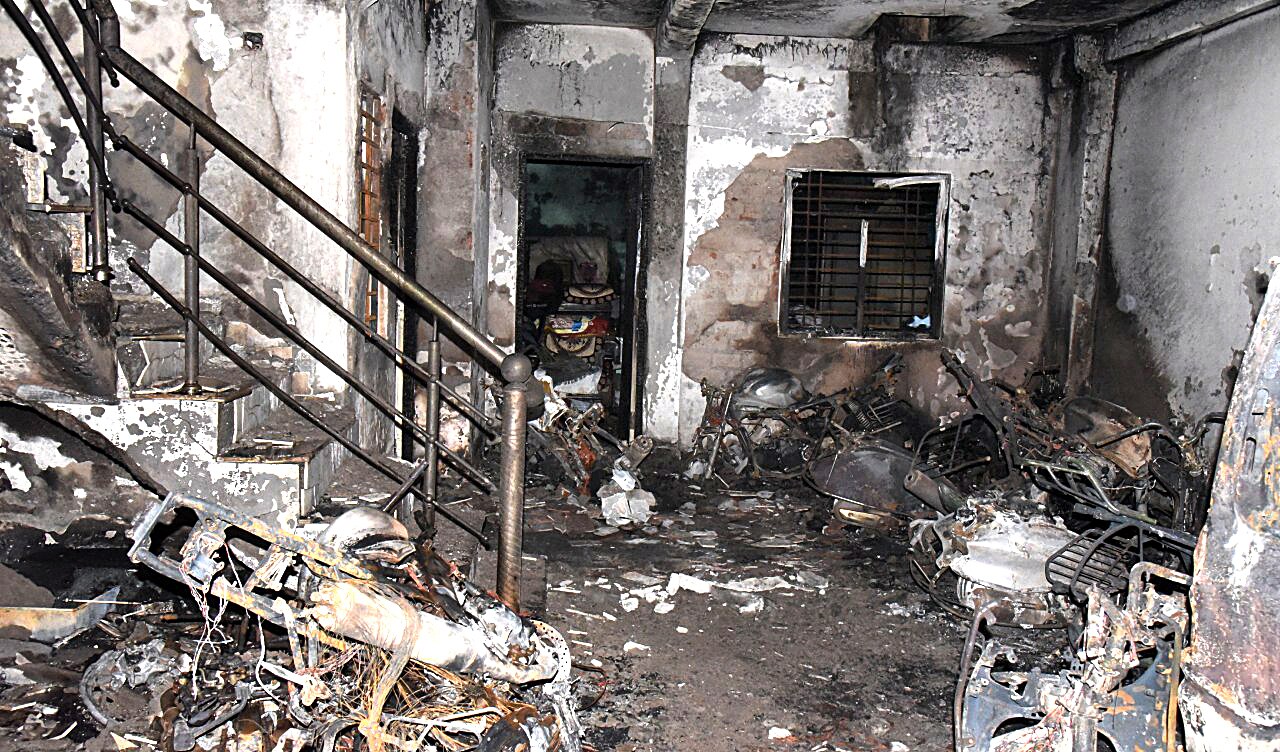 Charred remains are pictured after a massive fire broke out in a building, at Swarna Bagh Colony, in Indore on May 7, 2022. (ANI) Charred remains are pictured after a massive fire broke out in a building, at Swarna Bagh Colony, in Indore on May 7, 2022. (ANI)