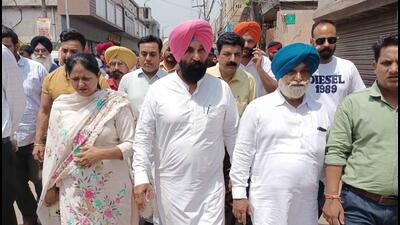MLA Kulwant Singh Sidhu and Rajinderpal Kaur Chhina during inauguration of road in Ludhiana on May 08, 2022. (HT PHOTO) MLA Kulwant Singh Sidhu and Rajinderpal Kaur Chhina during inauguration of road in Ludhiana on May 08, 2022. (HT PHOTO)