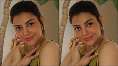 Additionally, the quirky pattern done in black, pink and pastel blue shades added an extra dose of detail to the ensemble. To match the minimal vibe of the dress, Kajal chose orange embellished high heel pumps, a diamond ring and gold statement ring, and patterned earrings with blue accents. (Instagram/@kajalaggarwalofficial) Additionally, the quirky pattern done in black, pink and pastel blue shades added an extra dose of detail to the ensemble. To match the minimal vibe of the dress, Kajal chose orange embellished high heel pumps, a diamond ring and gold statement ring, and patterned earrings with blue accents. (Instagram/@kajalaggarwalofficial)