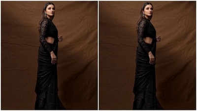 Parineeti's black sheer saree is from the shelves of the clothing label JADE by Monica and Karishma. It comes adorned with horizontal sequinned lines embroidered all over the drape, scalloped borders with chikankari embroidery, and intricate lace details on the border and pallu. (Instagram/@parineetichopra) Parineeti's black sheer saree is from the shelves of the clothing label JADE by Monica and Karishma. It comes adorned with horizontal sequinned lines embroidered all over the drape, scalloped borders with chikankari embroidery, and intricate lace details on the border and pallu. (Instagram/@parineetichopra)
