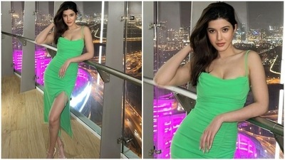 In another Instagram post, the gorgeous young and dynamic Shanaya Kapoor shines bright like the city lights in this green drawstring bodycon dress. (Instagram/@shanayakapoor02)