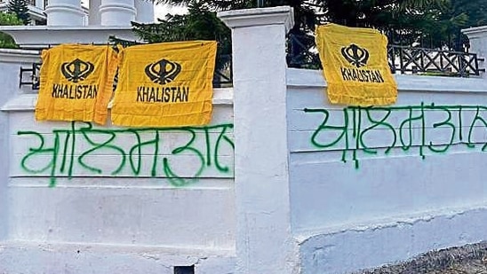 Khalistan flags were found tied to the main gate and separatist slogans scrawled on the boundary walls of the HP Legislative Assembly complex near Dharamshala on May 8. (HT PHOTO)