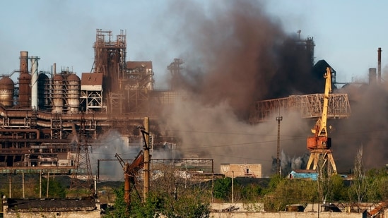 Smoke rises from the Metallurgical Combine Azovstal in Mariupol during shelling, in Mariupol, in territory under the government of the Donetsk People's Republic, eastern Ukraine.