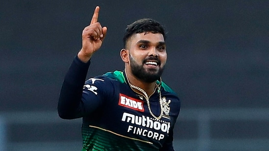 Wanindu Hasaranga of Royal Challengers Bangalore celebrates the wicket of Nicholas Pooran of Sunrisers Hyderabad(PTI)