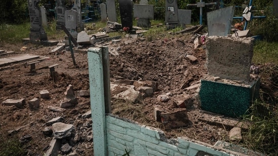 This photograph shows a destroyed cemetery by shelling in Seversk, eastern Ukraine, amid the Russian invasion of Ukraine.(AFP)