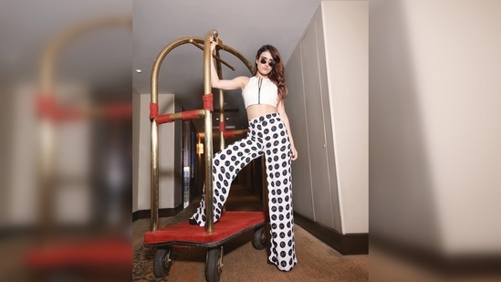 Fatima Sana Shaikh made the hotel luggage carrier her prop and posed like a boss lady.(Instagram/@fatimasanashaikh)