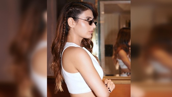 Fatima Sana Shaikh elevated her vintage look with vintage shades and platform heels.(Instagram/@fatimasanashaikh)