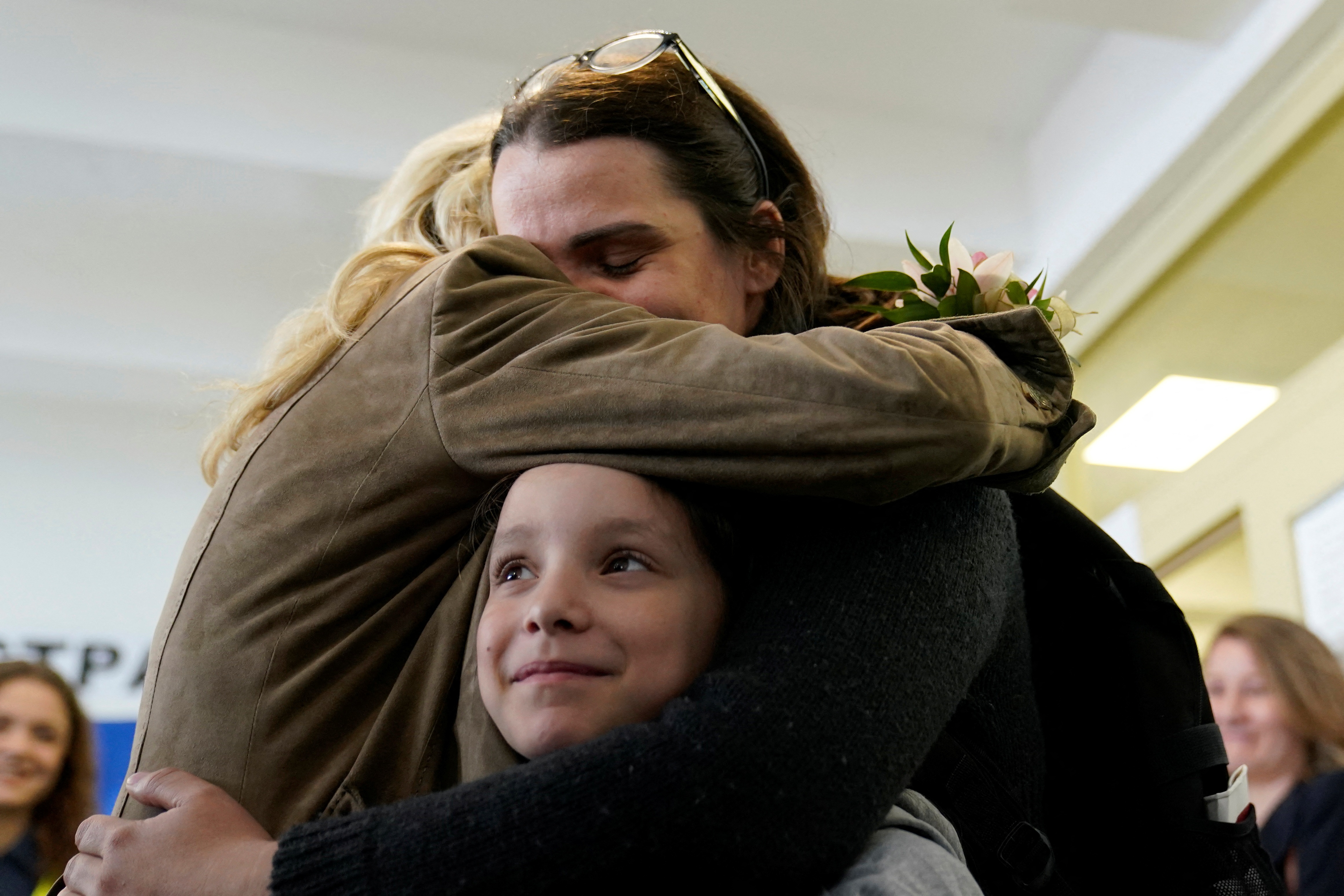 U.S. first lady Jill Biden gets a hug as she meets Ukrainian refugees and humanitarian workers at a city-run refugee center in Kosice, Slovakia,&nbsp; (REUTERS)