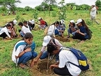 Students take part in a plantation drive.&nbsp;(Sanchit Khanna/HT archive)