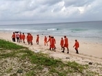 NDRF and police personnel at low lying areas of fishermen village, ahead of the landfall of Cyclone Asani, in Andaman and Nicobar Islands(PTI via NDRF)