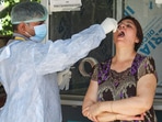 A healthworker collects swab samples of residents for Covid-19 testing, in Gurugram. (File image)