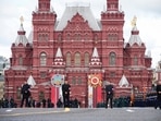 Security guards stand on Red Square prior to the Victory Day military parade in Moscow, Russia.(AP)