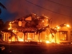Anti-government demonstrators set fire on the house owned by minister Sanath Nishantha of resigned Prime Minister Mahinda Rajapaksa's cabinet.