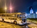 Charred remains of a bus is pictured near Sri Lanka's outgoing Prime Minister Mahinda Rajapaksa's official residence in Colombo. Charred remains of a bus is pictured near Sri Lanka's outgoing Prime Minister Mahinda Rajapaksa's official residence in Colombo.