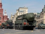 FILE PHOTO: Russian military vehicles, including Yars intercontinental ballistic missile systems, drive in Red Square during a rehearsal for a military parade marking the anniversary of the victory over Nazi Germany in World War Two in central Moscow.&nbsp;
