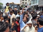 Locals protest in front of a bulldozer at Shaheen bagh in New Delhi on Monday.(Amal KS/HT Photo) Locals protest in front of a bulldozer at Shaheen bagh in New Delhi on Monday.(Amal KS/HT Photo)