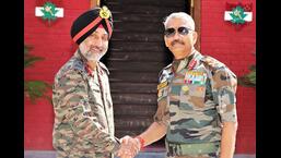 Lieutenant General DP Pandey (right) hands over the command of the Kashmir-based 15 Corps to Lieutenant General Amardeep Singh Aujla in Srinagar on Monday. (ANI Photo)