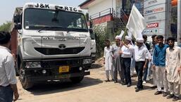 A truck carrying migratory tribals being flagged off from Jammu. (Photo: Tribal Affairs Deptt J&K/Twitter)