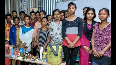 Slum kids with their creations (HT photo)