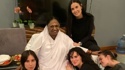 Demi Moore shares picture with her daughters and spiritual leader Amma.