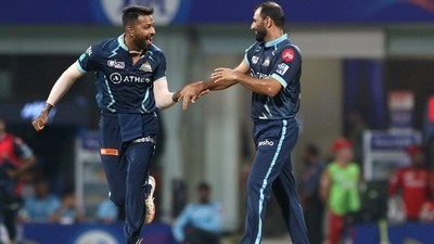 Mohammad Shami of Gujarat Titans celebrates with his captain Hardik Pandya (PTI) Mohammad Shami of Gujarat Titans celebrates with his captain Hardik Pandya (PTI)