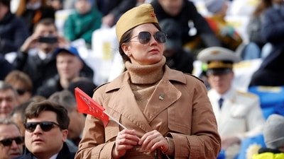 Spectators attend a military parade on Victory Day, which marks the 77th anniversary of the victory over Nazi Germany in World War Two, in Red Square in central Moscow, Russia. (REUTERS)
