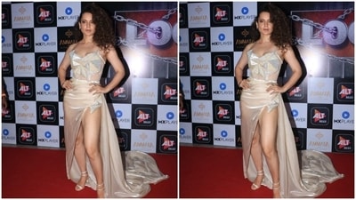 Kangana teamed the ensemble with minimal accessories, allowing it to be the star of her look. She chose statement rings, embellished silver high heels, and half hoop earrings. Side-parted open tresses styled in well-defined curls rounded it all off. (HT Photo/Varinder Chawla) Kangana teamed the ensemble with minimal accessories, allowing it to be the star of her look. She chose statement rings, embellished silver high heels, and half hoop earrings. Side-parted open tresses styled in well-defined curls rounded it all off. (HT Photo/Varinder Chawla)