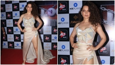 The strapless gown comes in a beige shade and glittering embellishments on the torso. It also features a plunging neckline, a shimmering corset-like top with a futuristic design in gold and silver, a silk-satin beige skirt, a risqué thigh-high slit flaunting her legs, a majestic floor-sweeping train and a figure-sculpting silhouette. (HT Photo/Varinder Chawla) The strapless gown comes in a beige shade and glittering embellishments on the torso. It also features a plunging neckline, a shimmering corset-like top with a futuristic design in gold and silver, a silk-satin beige skirt, a risqué thigh-high slit flaunting her legs, a majestic floor-sweeping train and a figure-sculpting silhouette. (HT Photo/Varinder Chawla)