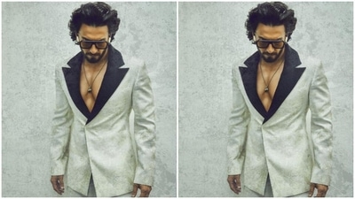 Ranveer looked absolutely stunning in an ivory white suit with black collars. He teamed it with a pair of ivory white formal trousers. (Instagram/@ranveersingh)