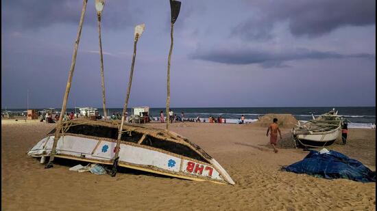 Anchored boats on the shore after the India Meteorological Department issued an alert for coastal states about Cyclone Asani, in Odisha’s Puri district on Sunday. (PTI PHOTO.)