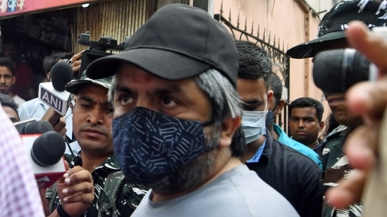 Dawood Ibrahim’s associate Salim Fruit being detained by the National Investigation Agency (NIA) after conducting a raid, in Mumbai on Monday, May 9, 2022. (ANI Photo)(Vijay Gohil)