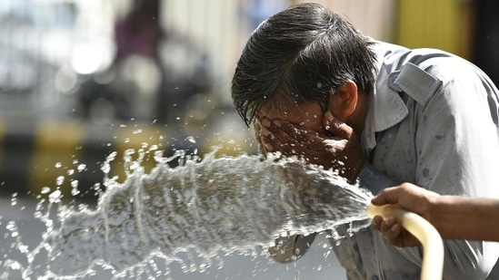 A heat haze engulfed roads and a dry hot wind threatened to sap out every ounce of body fluid on Sunday as the mercury touched 44.6 degrees Celsius, four notches above normal, in the city reeling under a heatwave. (Raj K Raj/HT PHOTO)