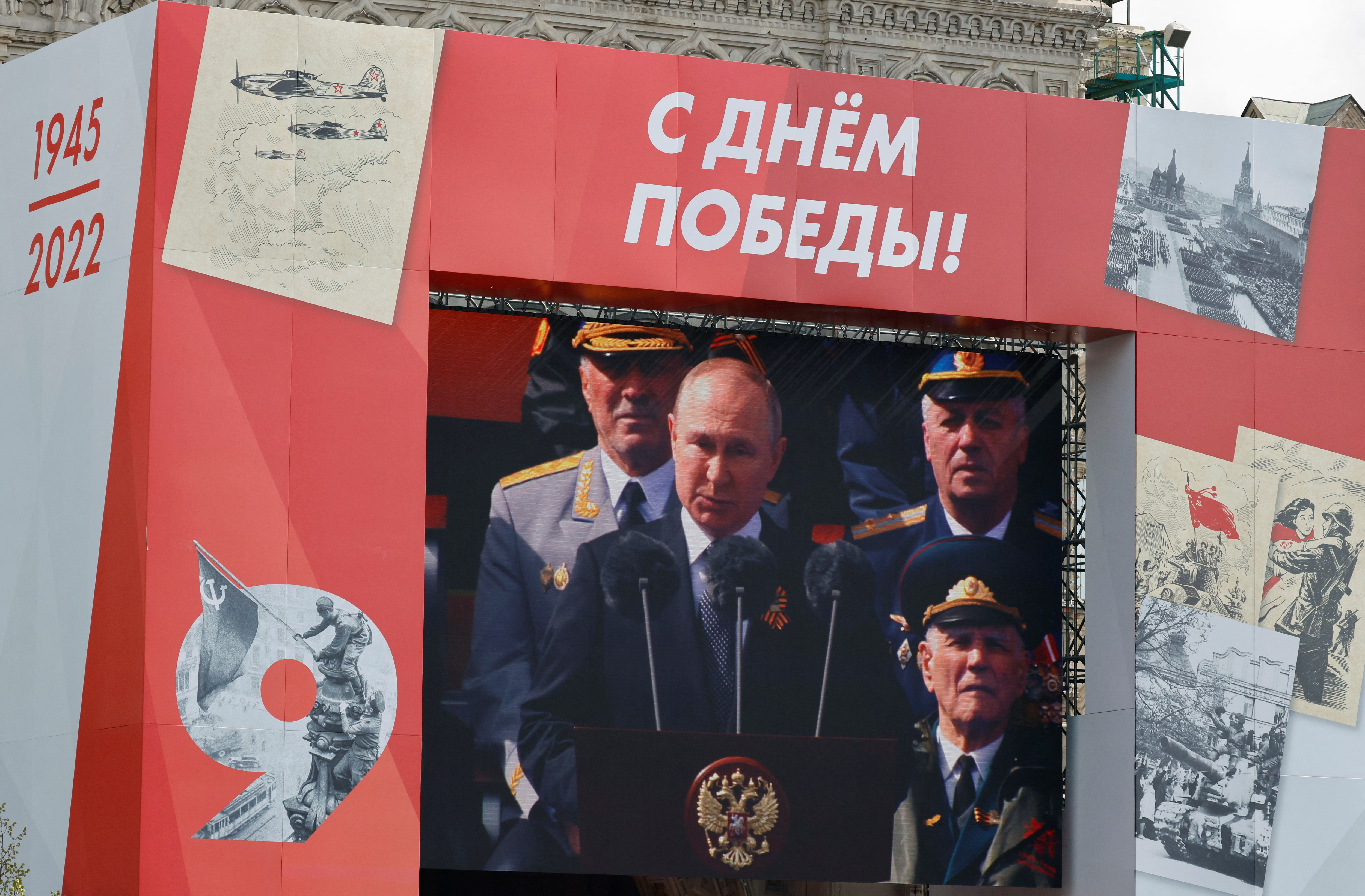 Russian President Vladimir Putin is seen on an electronic screen while delivering a speech during a military parade on Victory Day in Red Square, Moscow. (REUTERS)