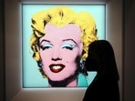 Warhol's painting received the highest price for any American work of art sold at auction(Carlo Allegri/REUTERS ) Warhol's painting received the highest price for any American work of art sold at auction(Carlo Allegri/REUTERS )