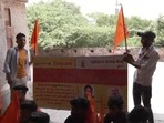 Members of Hindu outfit Mahakal Manav Sewa protest near Qutub Minar in Delhi on Tuesday. (ANI) Members of Hindu outfit Mahakal Manav Sewa protest near Qutub Minar in Delhi on Tuesday. (ANI)