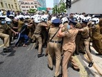 Sri Lanka crisis: Government supporters and police clash outside the President's office in Colombo on May 9, 2022.&nbsp;