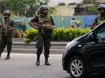 Sri Lankan army soldiers man a check point outside the prime minister's residence in Colombo. Sri Lankan army soldiers man a check point outside the prime minister's residence in Colombo.
