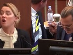 Johnny Depp's lawyers celebrate at Amber Heard's mention of Kate Moss. Johnny Depp's lawyers celebrate at Amber Heard's mention of Kate Moss.