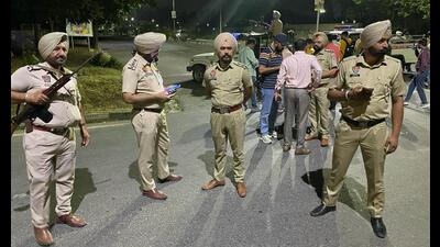 Punjab Police personnel cordon off their intelligence headquarters in Sector 77, Mohali, after the rocket-propelled grenade attack on Monday night. (Keshav Singh/HT) Punjab Police personnel cordon off their intelligence headquarters in Sector 77, Mohali, after the rocket-propelled grenade attack on Monday night. (Keshav Singh/HT)