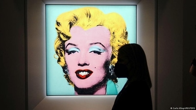 Warhol's painting received the highest price for any American work of art sold at auction (Carlo Allegri/REUTERS ) Warhol's painting received the highest price for any American work of art sold at auction (Carlo Allegri/REUTERS )