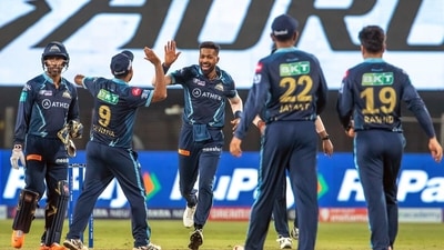 &nbsp;Gujarat Titans players celebrates after winning the Indian Premier League 2022 match against Lucknow Super Giants, at Maharashtra Cricket Association Stadium in Pune on Tuesday. Gujarat Titans becomes the first team to qualify for TATA IPL 2022 Playoffs.&nbsp; (ANI)