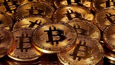 While crypto enthusiasts view bitcoin as a hedge against inflation, an influx of more traditional investors tend to view it as a riskier asset. (REUTERS)