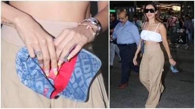 We also loved the star's neon tip French manicure in a lemon green shade. She added a layer of summer fun to her airport ensemble. If you love getting manicures, then this is a fun way to add a little twist to your good ol' French manicure. (HT Photo/Varinder Chawla)