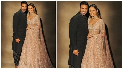 Akshay complemented his co-star in an all-black kurta and dhoti set. The star's outfit features a black bandhgala jacket with an embroidered neckline and buttoned-up front. He teamed with an asymmetric black kurta and matching silk dhoti and a pair of embellished juttis. (Instagram/@manushi_chhillar)