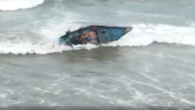 In a video posted by ANI on Twitter, the fishermen can be seen falling off a boat. In a video posted by ANI on Twitter, the fishermen can be seen falling off a boat.